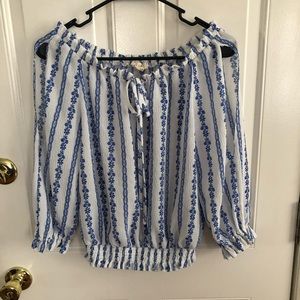 Blue and white floral blouse